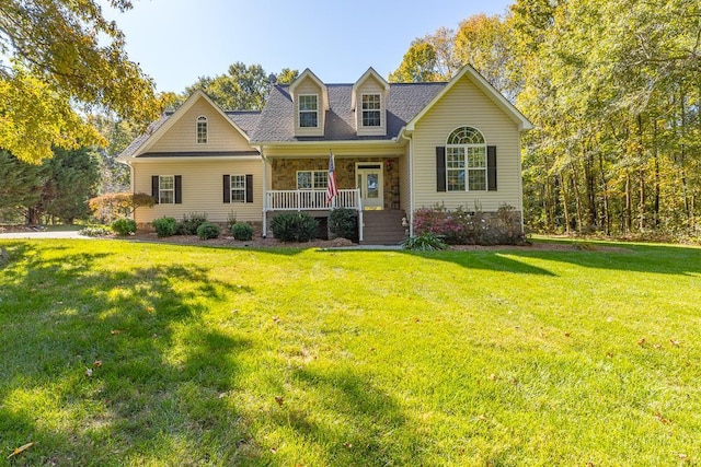 cape cod-style house with a front lawn and a porch