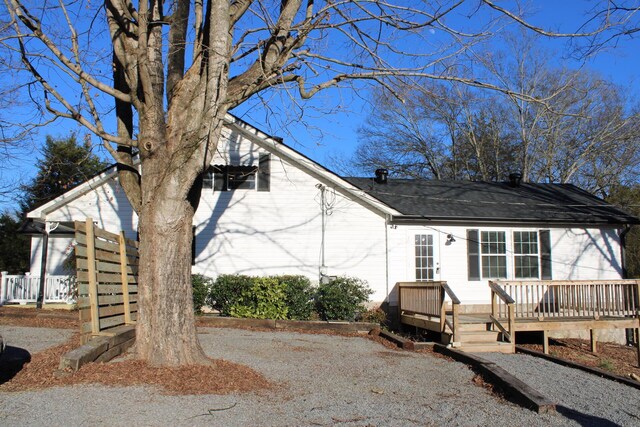 view of front of home with a wooden deck