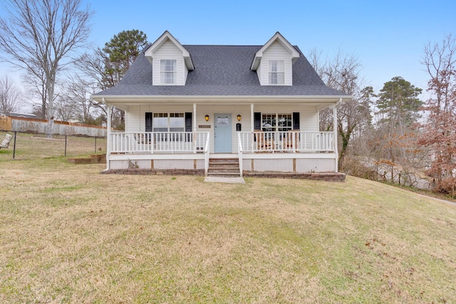 view of front of home with a front yard and covered porch