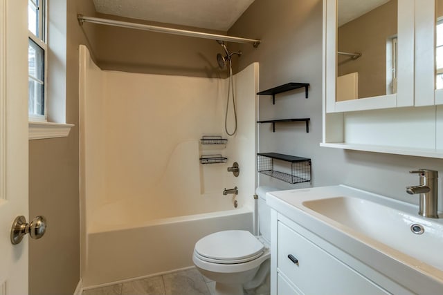 full bathroom with shower / tub combination, vanity, and toilet