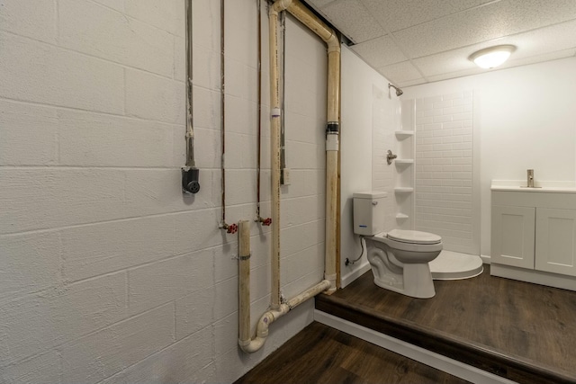 bathroom featuring hardwood / wood-style flooring, sink, and toilet