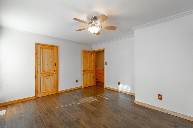 spare room with ceiling fan, dark wood-type flooring, and ornamental molding