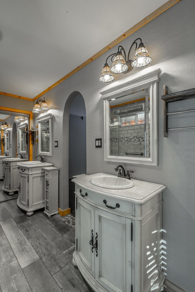 bathroom featuring vanity and crown molding