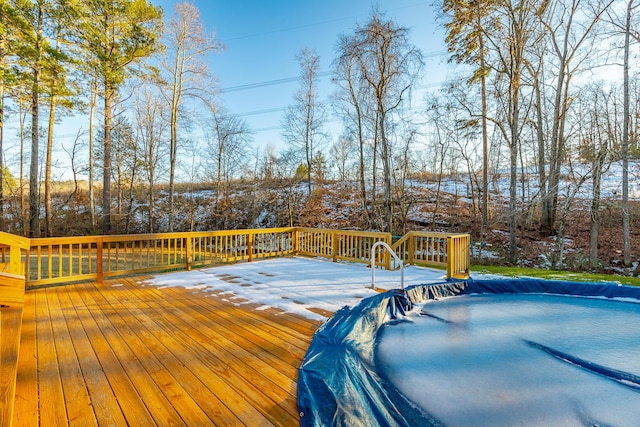 view of snow covered deck