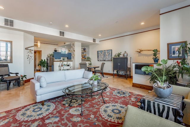 living room featuring light tile patterned floors