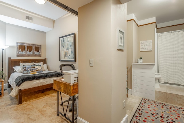 bedroom with ensuite bathroom