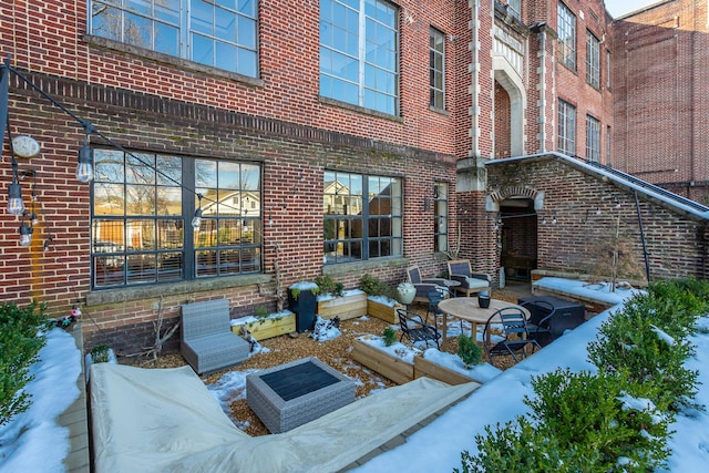 view of snow covered patio