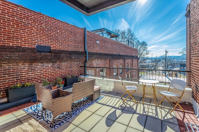 view of patio with a balcony