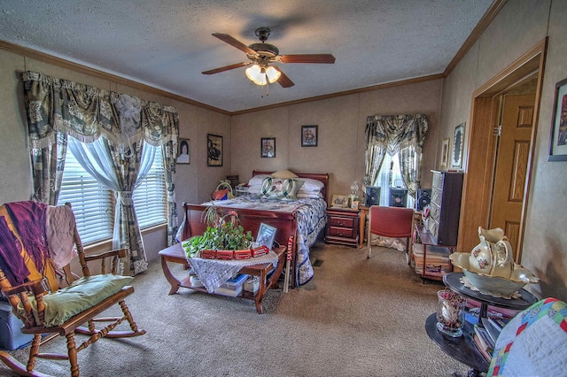 carpeted bedroom with ceiling fan, a textured ceiling, and ornamental molding