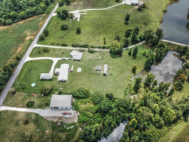 birds eye view of property featuring a rural view and a water view