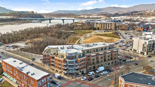 bird's eye view featuring a water and mountain view