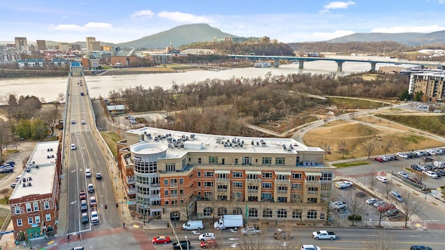 birds eye view of property with a mountain view