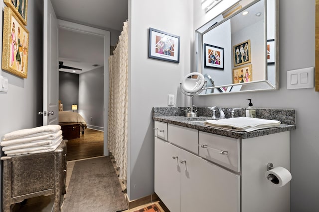 bathroom with vanity and ceiling fan