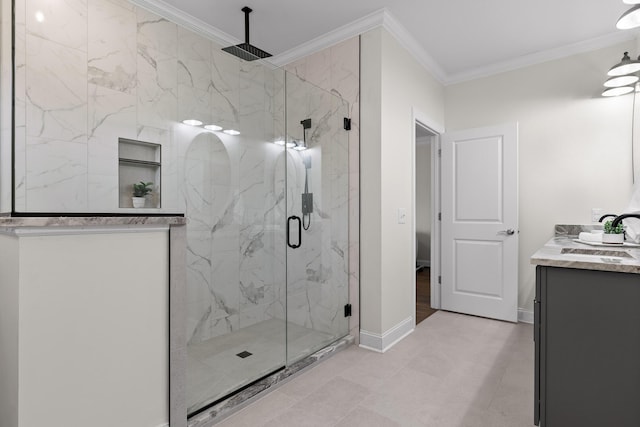 bathroom with a shower with door, crown molding, and vanity