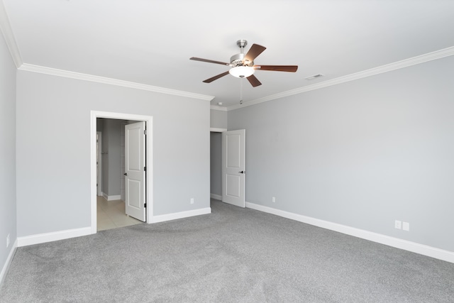 unfurnished bedroom with ceiling fan, ornamental molding, and light colored carpet