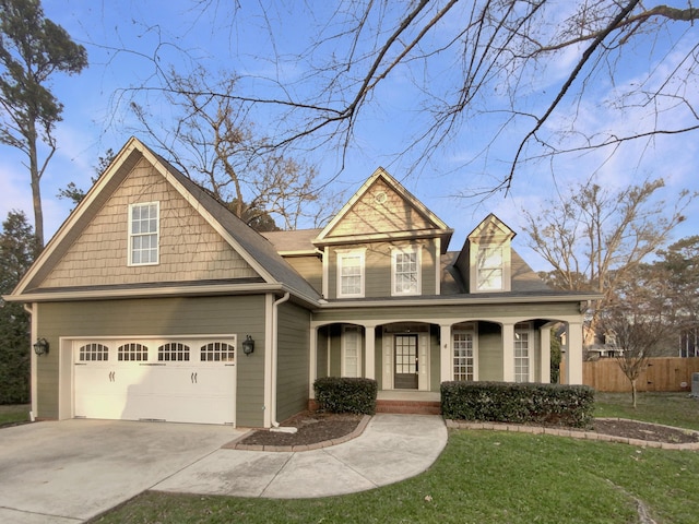 view of front facade featuring a front lawn and a porch