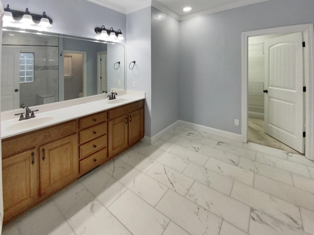 bathroom with a shower with door, vanity, and ornamental molding