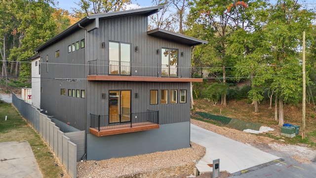 contemporary house featuring a balcony