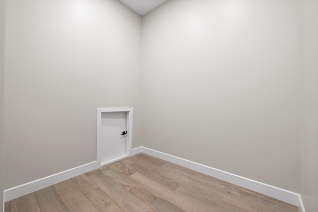 unfurnished room with light hardwood / wood-style floors