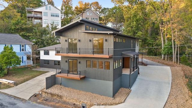 view of front of home with a balcony