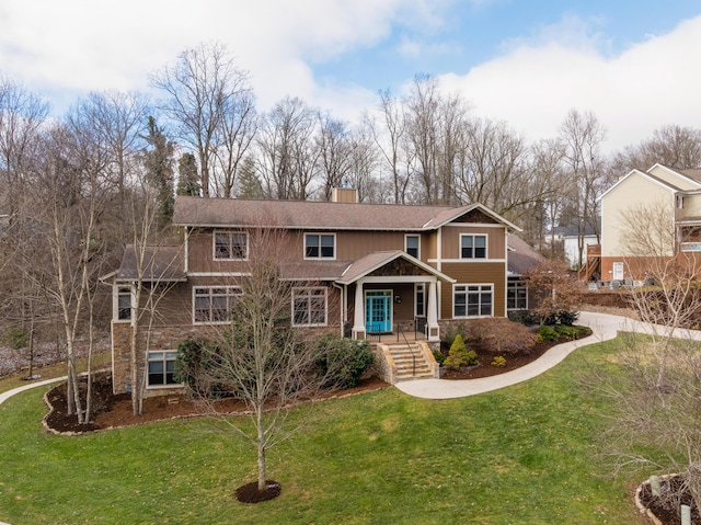 view of front of home with a front yard