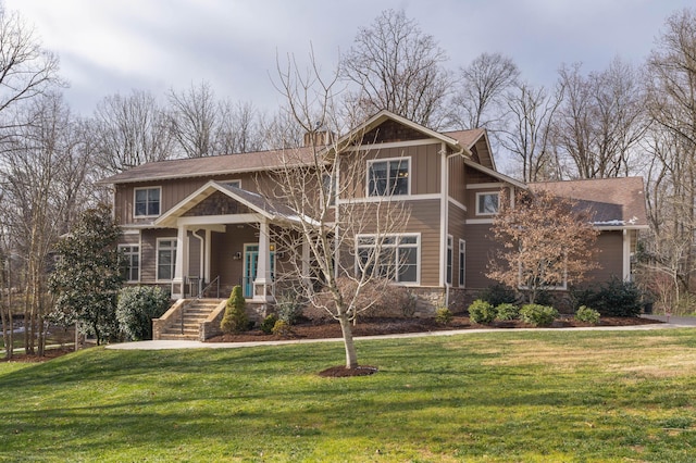 craftsman inspired home with a front yard