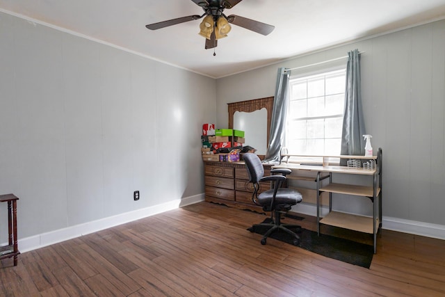 office space featuring wood-type flooring, ornamental molding, and ceiling fan