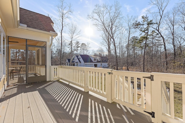 wooden terrace with a sunroom