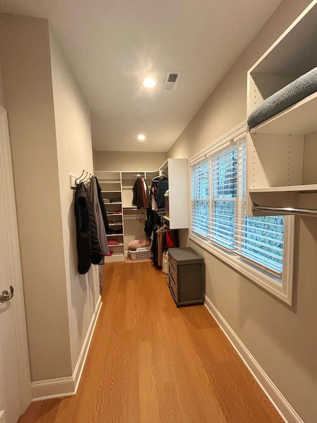 spacious closet with light wood-type flooring