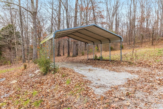 view of parking / parking lot with a carport