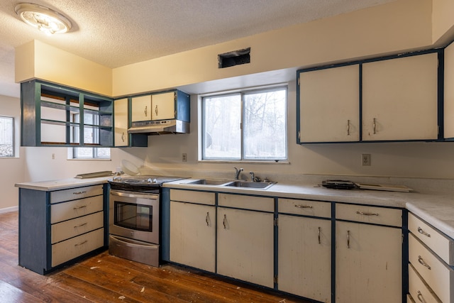 kitchen with a textured ceiling, dark wood-type flooring, sink, white cabinets, and stainless steel electric range oven