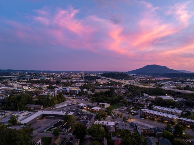 aerial view at dusk with a mountain view