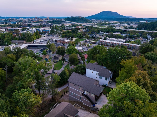 aerial view at dusk with a mountain view