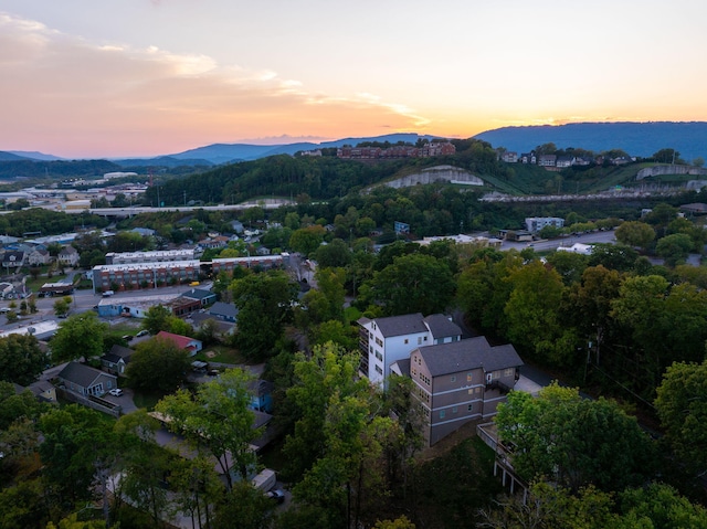 aerial view at dusk with a mountain view