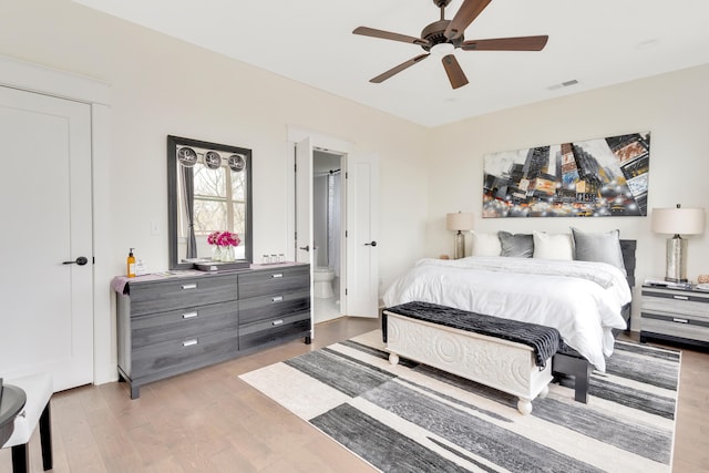 bedroom with ceiling fan and light hardwood / wood-style floors