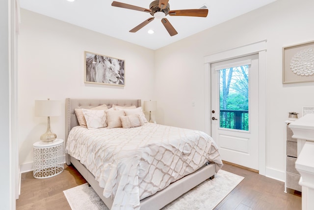 bedroom featuring ceiling fan and hardwood / wood-style floors