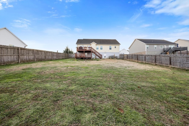 view of yard with a wooden deck