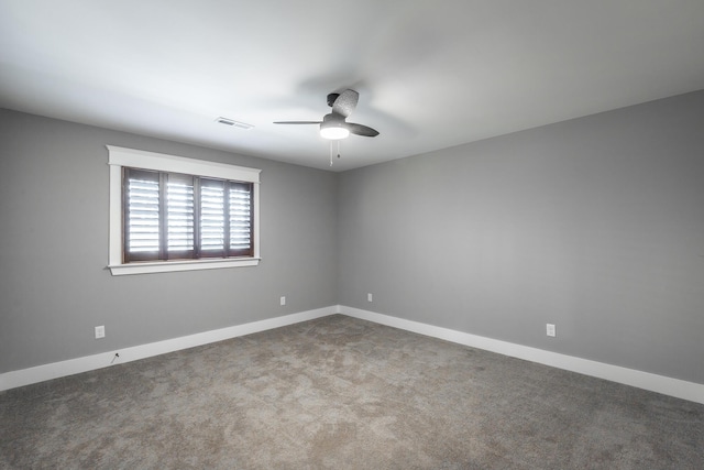 unfurnished room featuring ceiling fan and carpet floors