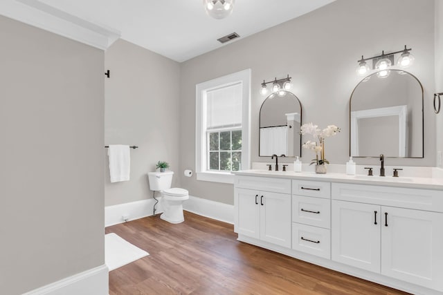 802 E Martin Luther King Blvd, Chattanooga, TN 37403 - full bathroom featuring double vanity and wood finished floors