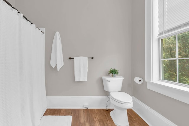 802 E Martin Luther King Blvd, Chattanooga, TN 37403 - bathroom featuring wood finished floors and curtained shower