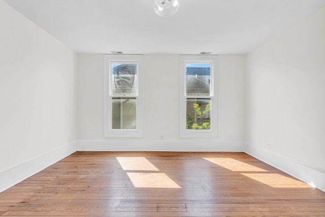 802 E Martin Luther King Blvd, Chattanooga, TN 37403 - empty room featuring wood-type flooring and plenty of natural light