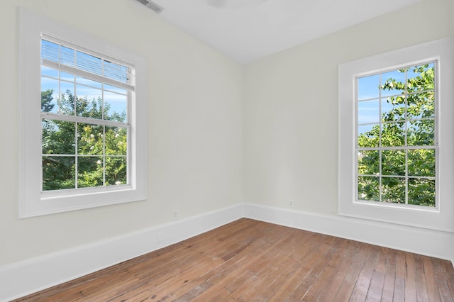 802 E Martin Luther King Blvd, Chattanooga, TN 37403 - spare room featuring wood-type flooring and baseboards