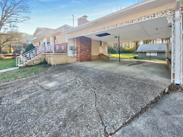 view of property exterior with a carport