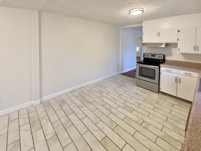 kitchen featuring a textured ceiling, white cabinets, extractor fan, and stainless steel electric range