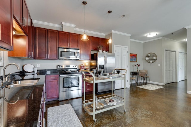 kitchen with sink, crown molding, dark stone counters, pendant lighting, and appliances with stainless steel finishes