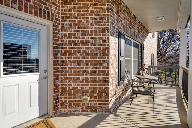 balcony featuring a porch