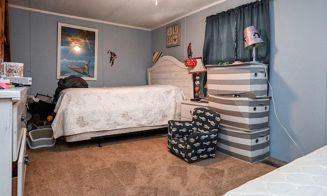 bedroom featuring crown molding and carpet floors