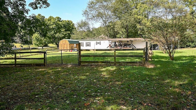 view of yard with a storage shed