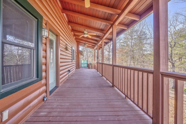 wooden deck with ceiling fan