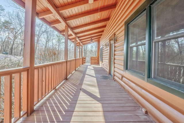 view of snow covered deck